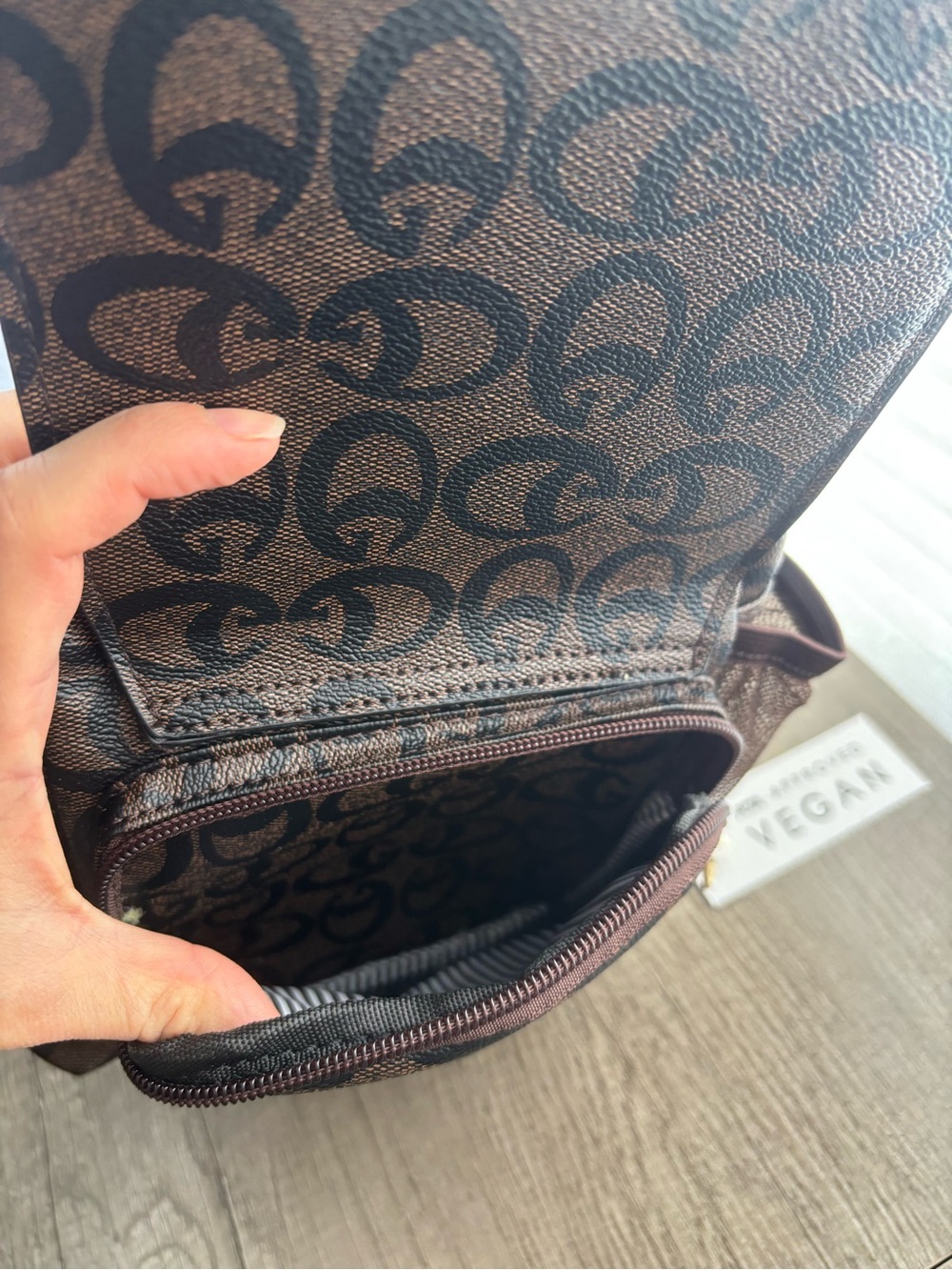 Brown Sling Backpack with Signature Pattern - Picture 5 of 8